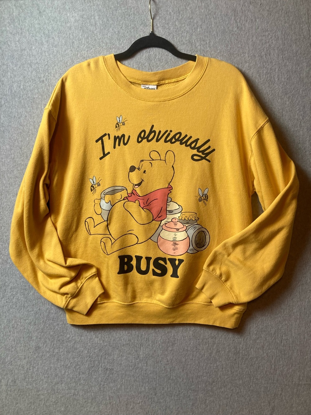Women’s Yellow Winnie the Pooh 'I'm Obviously Busy' Graphic Sweatshirt Large